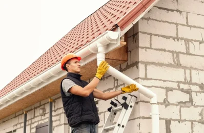 Pose et remplacement de gouttières à Sarcos